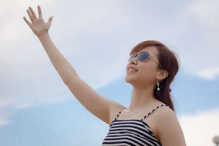 Portrait of thai adult businesswoman beautiful girl relax and smile.の写真素材