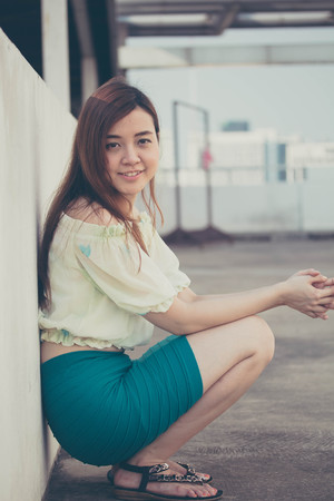 Portrait of thai adult businesswoman beautiful girl relax and smileの写真素材