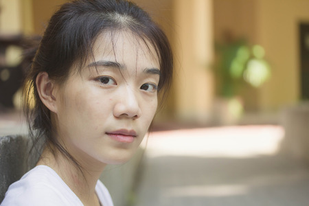 asia beautiful girl relax and looking at cameraの写真素材