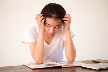 asia thai china student university beautiful girl read a bookの写真素材