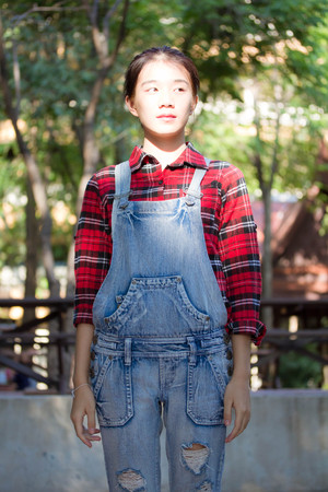 asia thai teenager Women Scotch T-Shirt relax and smileの写真素材