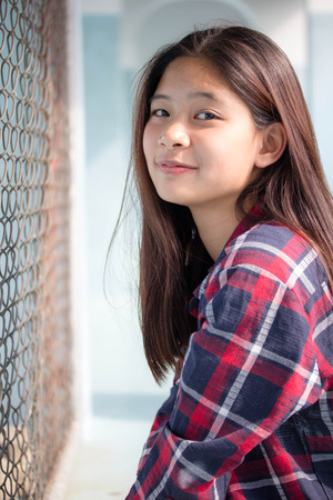 asia thai teenager Women Scotch T-Shirt relax and smileの写真素材