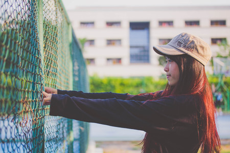 asia thai teenager Women black T-Shirt relax and smileの写真素材