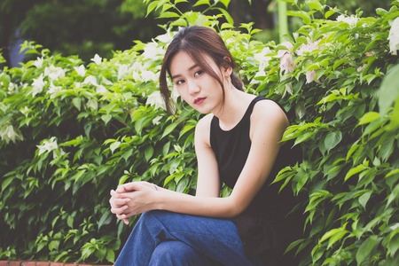 Portrait of thai adult beautiful girl relax and smileの写真素材