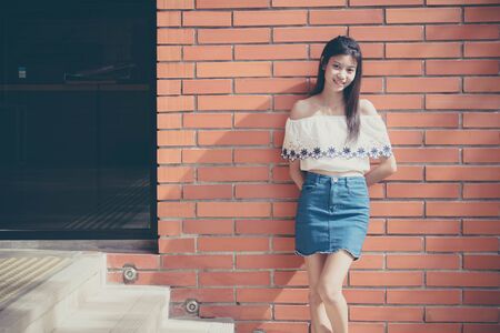 asia thai adult Women jeans denim relax and smileの写真素材