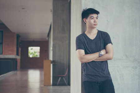 asia thai adult man jeans denim relax and smileの写真素材