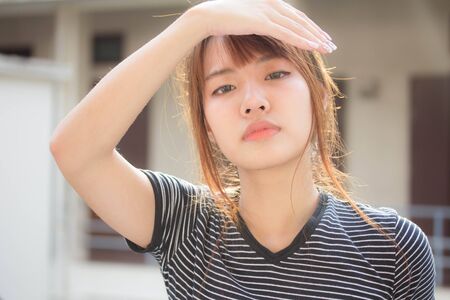 Portrait of thai adult beautiful girl relax and smile