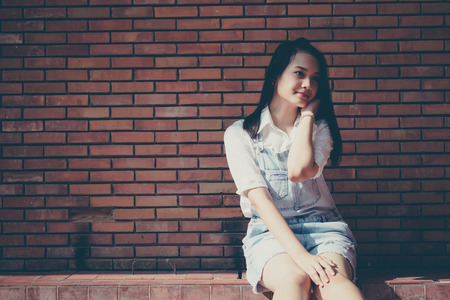 Portrait of thai teen beautiful girl happy and relaxの写真素材