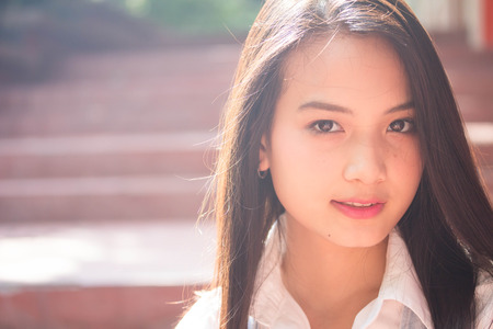 Portrait of thai teen beautiful girl happy and relaxの写真素材
