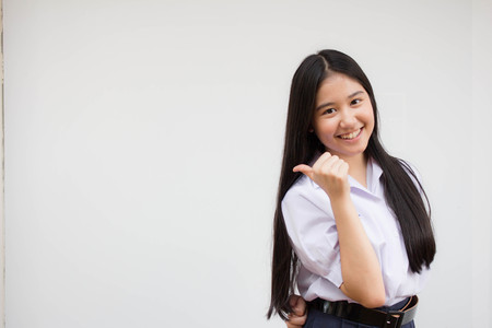 Portrait of thai high school student uniform teen beautiful girl happy and relaxの写真素材