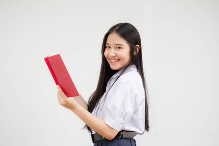 asia thai high school student uniform beautiful girl read a bookの写真素材