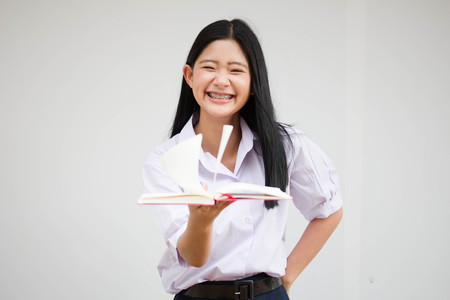asia thai high school student uniform beautiful girl read a bookの写真素材