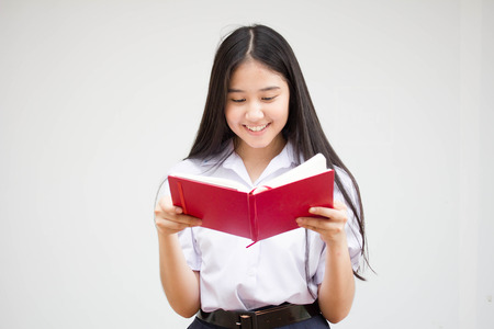 asia thai high school student uniform beautiful girl read a bookの写真素材