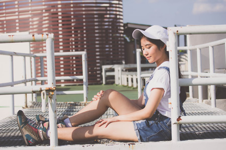Portrait of thai teen beautiful girl happy and relaxの写真素材