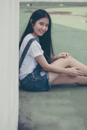 Portrait of thai teen beautiful girl happy and relax