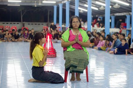 Student 11-12 years old, Scout activities, dance performances around the fire., TeePangKorn Scout Camp in Samut Sakhon Thailand.のeditorial素材