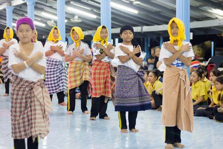 Student 11-12 years old, Scout activities, dance performances around the fire., TeePangKorn Scout Camp in Samut Sakhon Thailand.のeditorial素材
