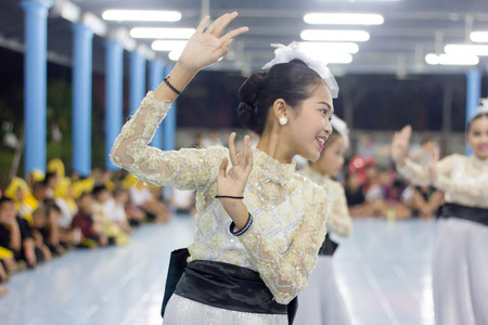 Student 11-12 years old, Scout activities, dance performances around the fire., TeePangKorn Scout Camp in Samut Sakhon Thailand.のeditorial素材