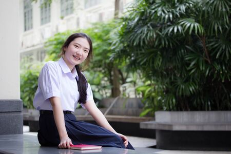 Portrait of thai china teen beautiful girl happy and relaxの写真素材