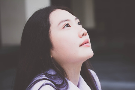 Portrait of thai china teen beautiful girl happy and relaxの写真素材