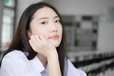 Portrait of thai china teen beautiful girl happy and relaxの写真素材