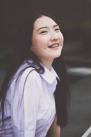 Portrait of thai china teen beautiful girl happy and relaxの写真素材