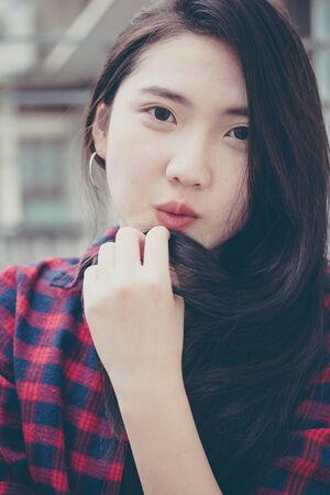 Portrait of thai china teen beautiful girl happy and relaxの写真素材