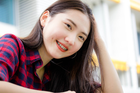 Portrait of thai china teen beautiful girl happy and relaxの写真素材