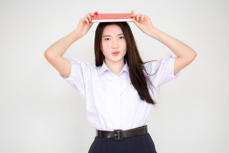 asia thai high school student uniform beautiful girl read a bookの写真素材