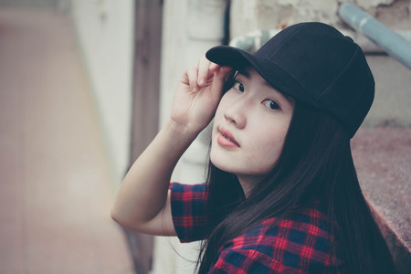 Portrait of thai china teen beautiful girl happy and relaxの写真素材