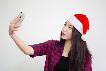 Portrait of thai china beautiful girl using her smart phone Selfieの写真素材