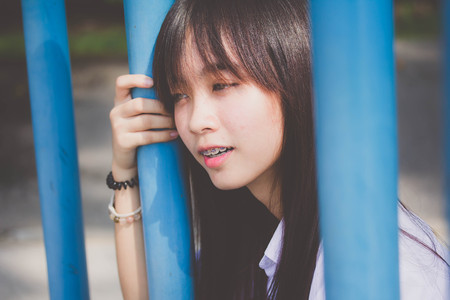 Portrait of thai high school student uniform teen beautiful girl happy and relaxの写真素材