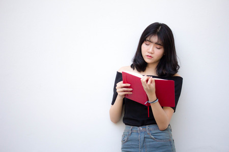 asia thai vietnam teen beautiful girl read a bookの写真素材