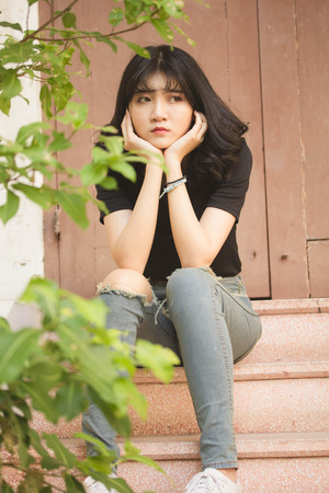 Portrait of vietnam high school teen beautiful girl happy in vintage styleの写真素材
