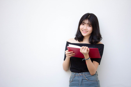 asia thai vietnam teen beautiful girl read a bookの写真素材