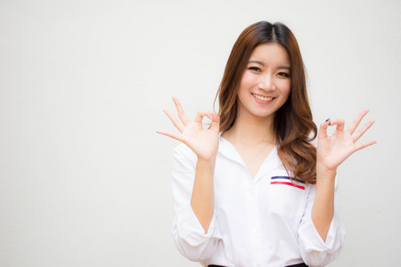 Portrait of thai adult working women white shirt OKの写真素材