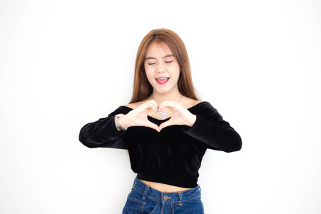 Portrait of thai adult beautiful girl give heart