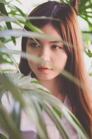 Portrait of thai adult student university uniform beautiful girl relax and smileの写真素材