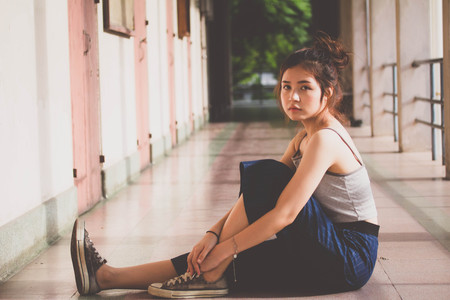 Portrait of thai adult beautiful girl relax and smileの写真素材