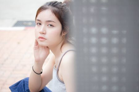 Portrait of thai adult beautiful girl relax and smileの写真素材