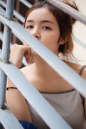 Portrait of thai adult beautiful girl relax and smileの写真素材