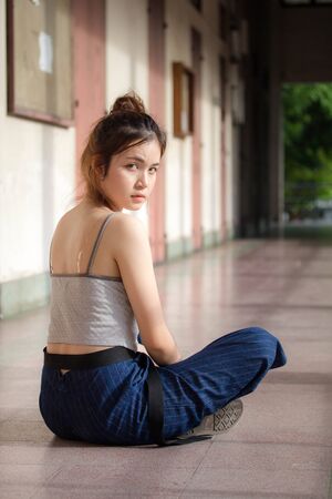 Portrait of thai adult beautiful girl relax and smileの写真素材