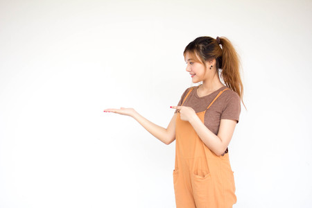 Beautiful young adult thai chinese bronze hair show handの写真素材