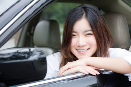 thai adult working women white shirt in carの写真素材