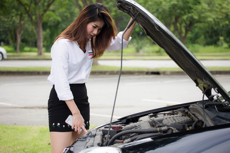 thai adult working women white shirt broken carの写真素材