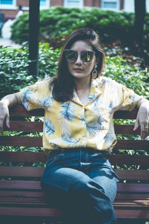 Portrait of thai yellow shirt adult beautiful girl relax time, in Vintage Style