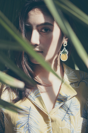 Portrait of thai yellow shirt adult beautiful girl relax time, in Vintage Styleの写真素材