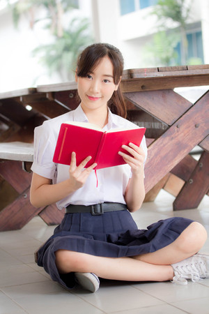 asia thai high school student uniform beautiful girl read a bookの写真素材