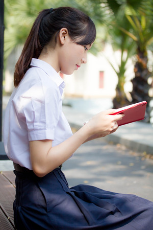 asia thai high school student uniform beautiful girl read a bookの写真素材