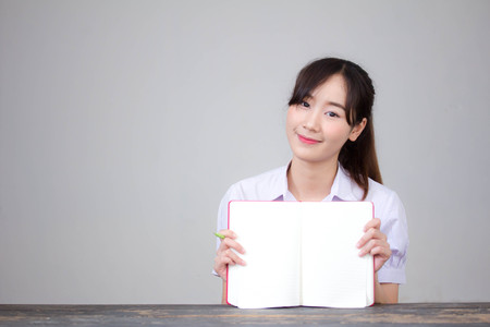 asia thai high school student uniform beautiful girl read a bookの写真素材